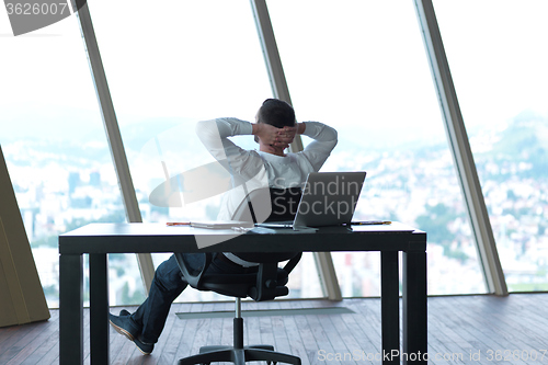 Image of young business man at office