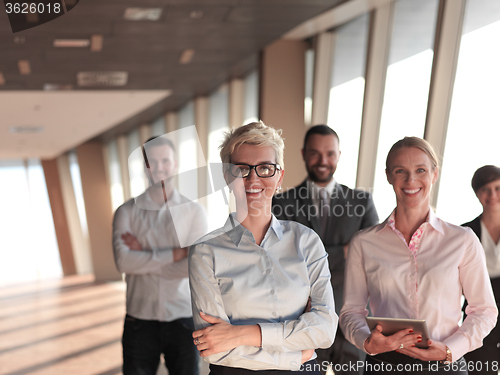 Image of business people group standing together