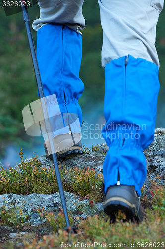 Image of hiking man with trekking boots