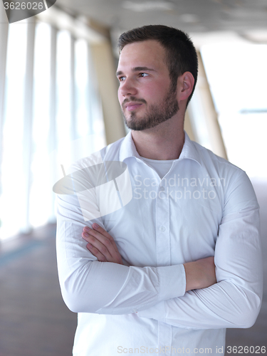 Image of portrait of young  business man with beard at modern office