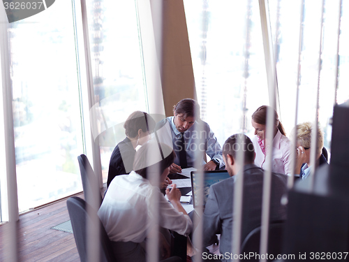 Image of business people group on meeting at bright modern office