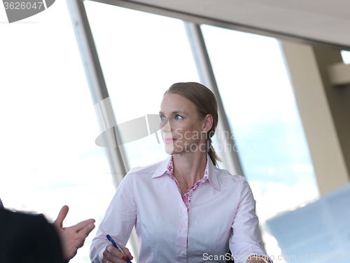 Image of business people group on meeting at bright modern office