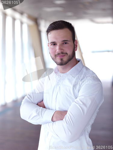 Image of portrait of young  business man with beard at modern office