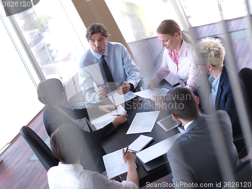 Image of business people group on meeting at bright modern office