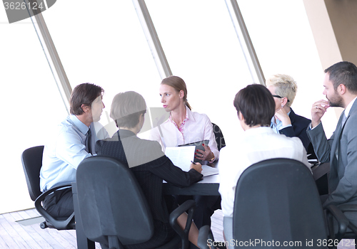 Image of business people group on meeting at bright modern office