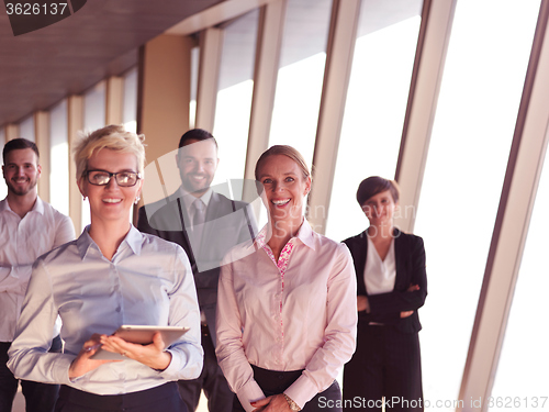 Image of business people group standing together