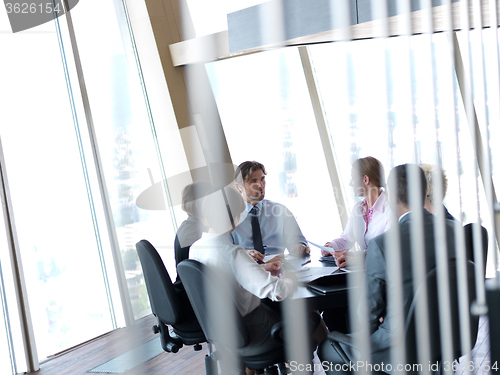Image of business people group on meeting at bright modern office
