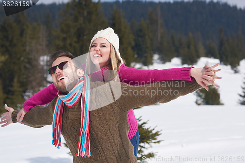 Image of romantic young couple on winter vacation