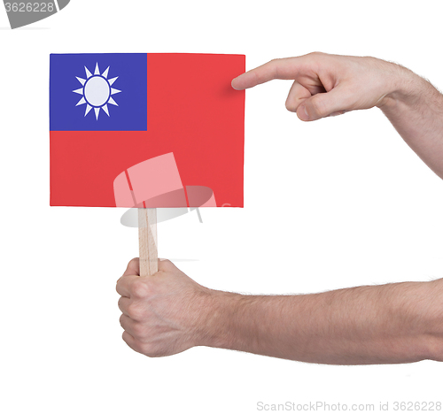 Image of Hand holding small card - Flag of Taiwan
