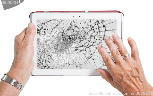 Image of Senior lady with tablet, cracked screen