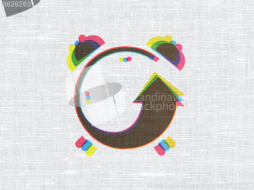 Image of Timeline concept: Alarm Clock on fabric texture background