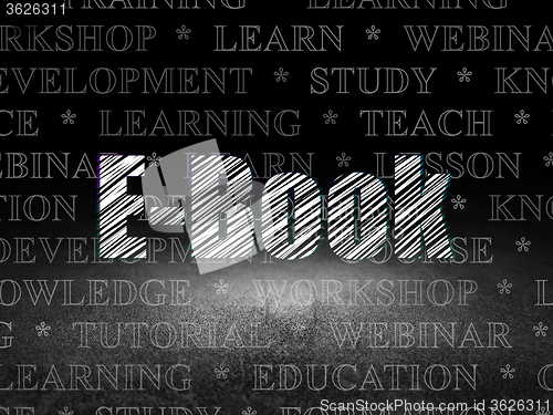Image of Learning concept: E-Book in grunge dark room