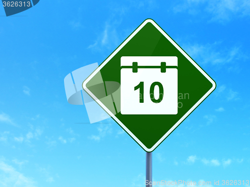 Image of Timeline concept: Calendar on road sign background