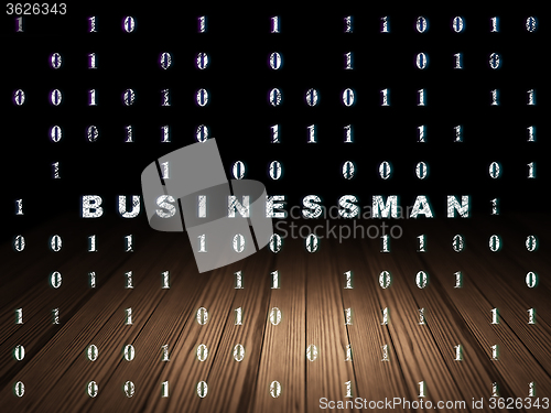 Image of Business concept: Businessman in grunge dark room