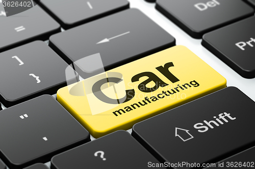 Image of Manufacuring concept: Car Manufacturing on computer keyboard background