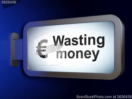 Image of Banking concept: Wasting Money and Euro on billboard background