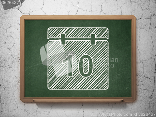Image of Timeline concept: Calendar on chalkboard background