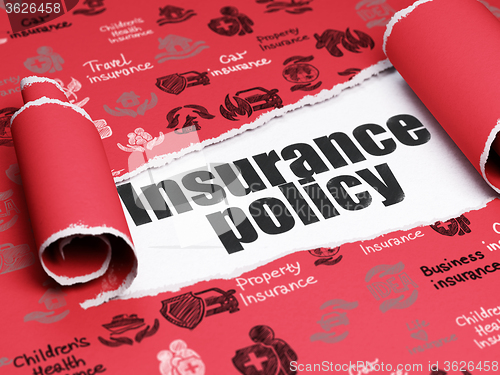 Image of Insurance concept: black text Insurance Policy under the piece of  torn paper