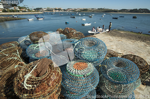 Image of EUROPE PORTUGAL PORTO BEACH COAST ATLANTIC FISHING