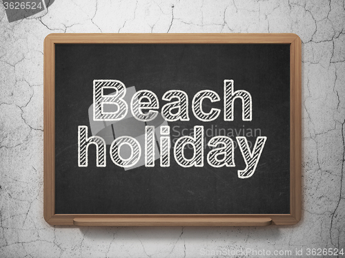 Image of Tourism concept: Beach Holiday on chalkboard background