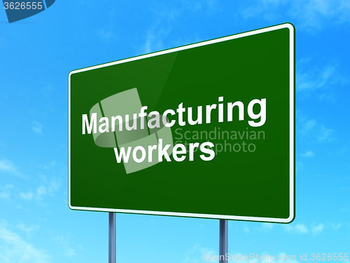 Image of Industry concept: Manufacturing Workers on road sign background