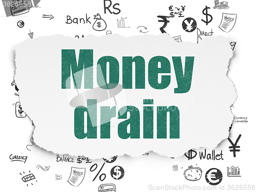Image of Money concept: Money Drain on Torn Paper background