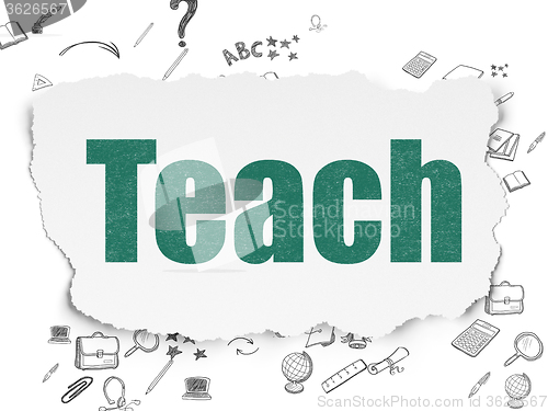 Image of Education concept: Teach on Torn Paper background