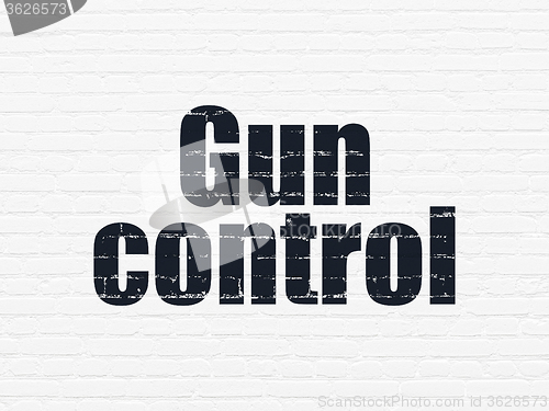 Image of Security concept: Gun Control on wall background