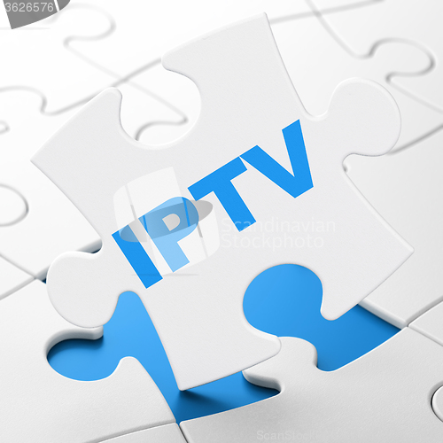 Image of Web development concept: IPTV on puzzle background