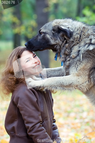 Image of teenager with a dog