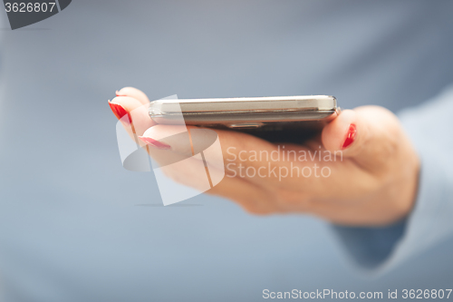 Image of Woman with smartphone