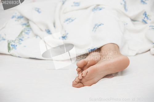 Image of Feet of sleeping woman