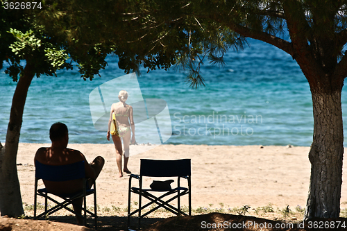 Image of Man and wife at the beach in the  Peloponese in greece