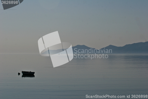 Image of Boat in the morning mist  Peloponese in Greece 