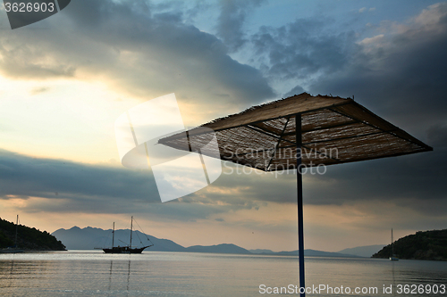 Image of Parasol on a beach in the Peloponese in greece in the summer