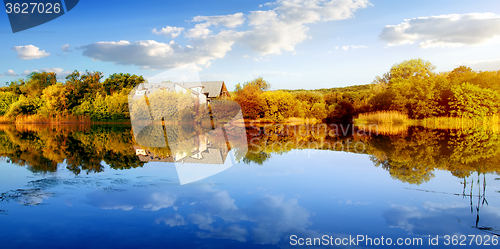 Image of House in autumn forest