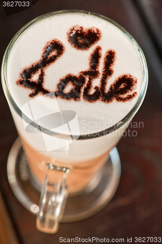 Image of closeup of glass with latte i