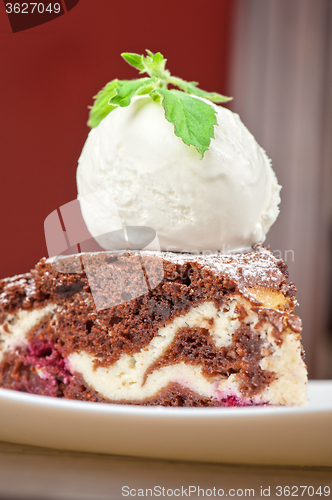 Image of chocolate cake with jam ice cream