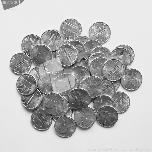 Image of Black and white Dollar coins 1 cent