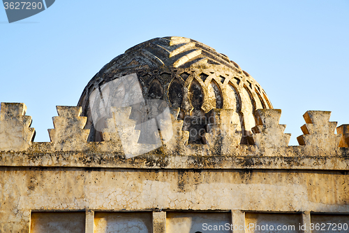 Image of dome    old ruin in        morocco and sky  near the tower