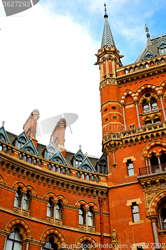 Image of old architecture in windows and brick exterior wall