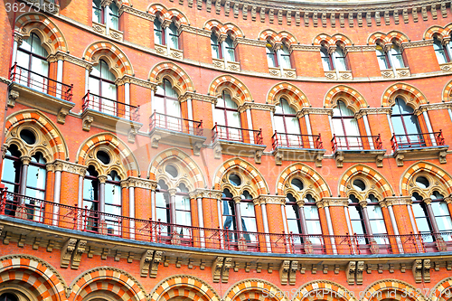 Image of old wall  in  windows and brick exterior    