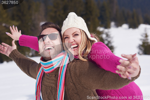 Image of romantic young couple on winter vacation