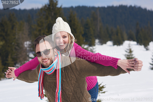 Image of romantic young couple on winter vacation