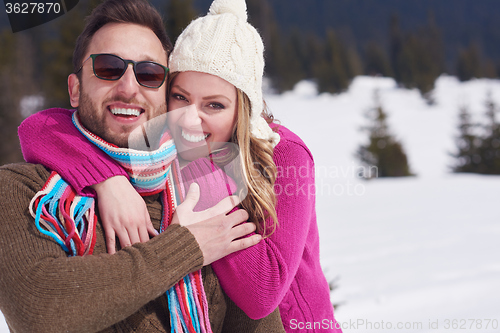 Image of romantic young couple on winter vacation