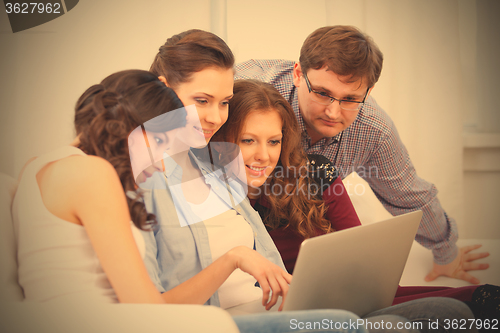 Image of students and a notebook