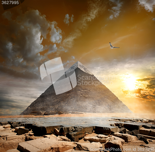 Image of Pyramid under clouds