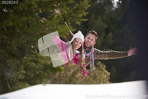 Image of romantic young couple on winter vacation