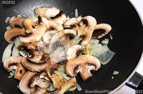 Image of Mushroom onion stir-fry in wok