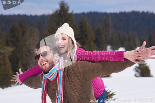Image of romantic young couple on winter vacation